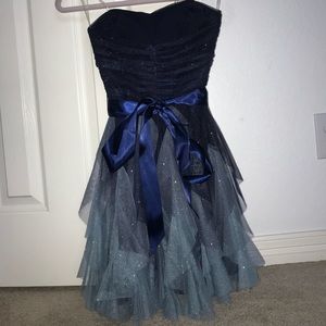 strapless, sparkly, blue dress with satin ribbon.